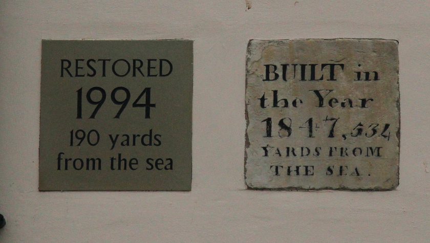 Plaques on the side of the Blue Bell, Kilnsea. They illustrate the destructive power of the North Sea. Destructive seas appear in Tolkien's work at the end of the First Age, and the Downfall of Numenor in the Second Age.